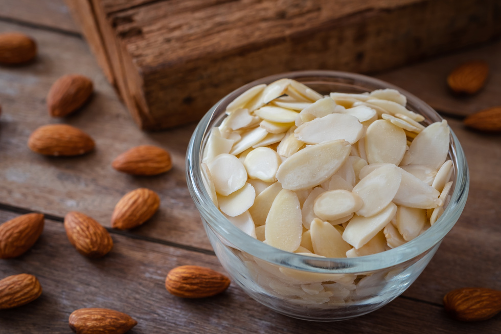 Almond slices in glass bowl